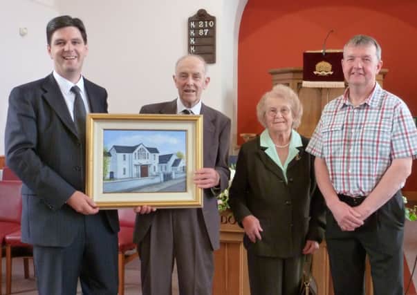 Mr and Mrs Robert McLernon pictured at  a presentation to mark Robert's retirement from the post of Clerk of Session at Ballyweaney Presbyterian Church, which he had held for 17 years. Also included in the photo is the new Clerk of Session Mr Alan Brown and Minister, Rev Kenneth Henderson.