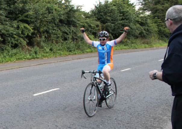 Bann Valley's Brian McAuley celebrates his victory in the club's youth race at Gortmacrane last week.