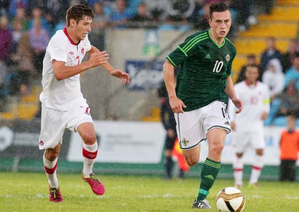 Northern Ireland's Aaron McEneff races away from Canada's Louis Beland-Goyette, during Friday night's Milk Cup Elite Section final. Picture by Jonathan Porter/Presseye.com