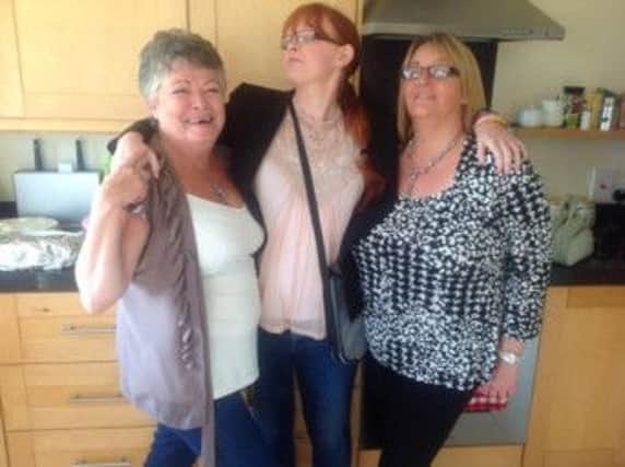 Janine (middle) with her Auntie Sharon Harrison and mum Pauline Hogg before the head shaving party