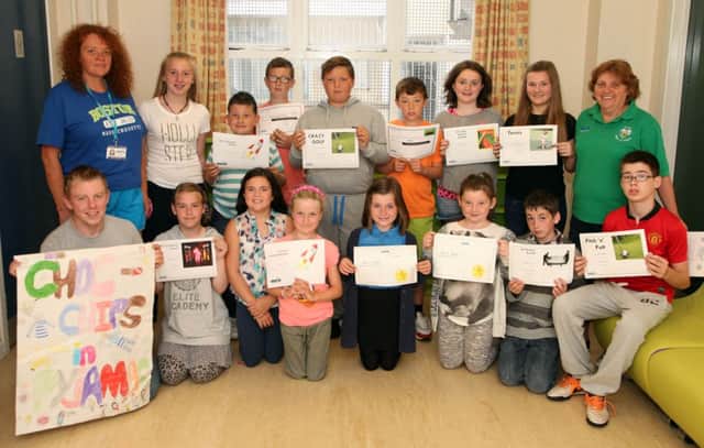 The Portrush Summer Scheme prizewinners pictured with leaders Jill and Collette. INCR32-312PL