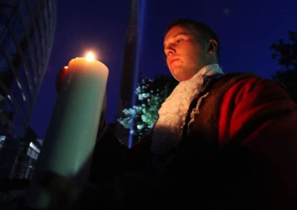 Mayor Thomas Hogg takes part in the Lights Out event at Mossley Mill to mark the centenary of the outbreak of the First World War. Pic by Paul Moane, Aurora PA