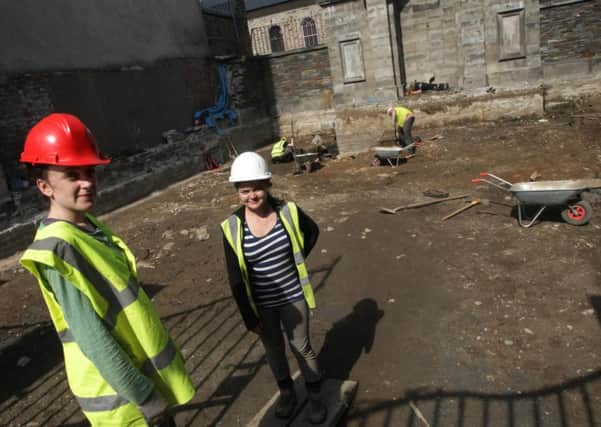 Two of the archaeologists, Charlene Conway and Marie Parrish pictured starting work on the Apprentice Boys of Derry Siege Museum site at Society Street on Monday morning. INLS3214MC021
