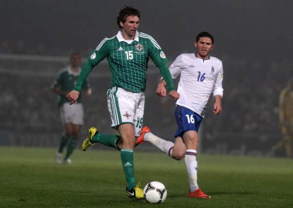 Northern Ireland international Paddy McCourt is thought to be wanted by Bury