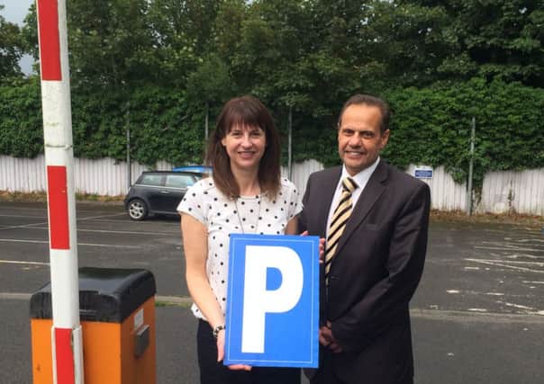 Wendy Bell, Owner of A G Speer and David McCallum, Chairman of Lisburn City Centre Management at the Charity Car Park on Castle Street