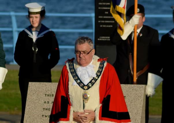 Mayor of Carrickfergus Alderman Charles Johnston at the wreath laying at Carrickfergus cenotaph. INCT  32-144-GR
