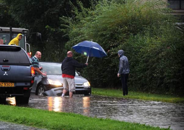 Motorists struggled with the torrential rain on Tuesday evening which left many roads flooded  in Mid-Ulster .INMM3214-426