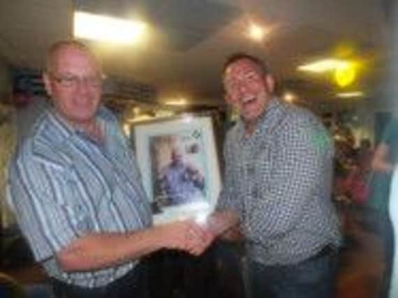 Fundraisers Derek Thorpe and Andrew Hutchinson celebrate their success.