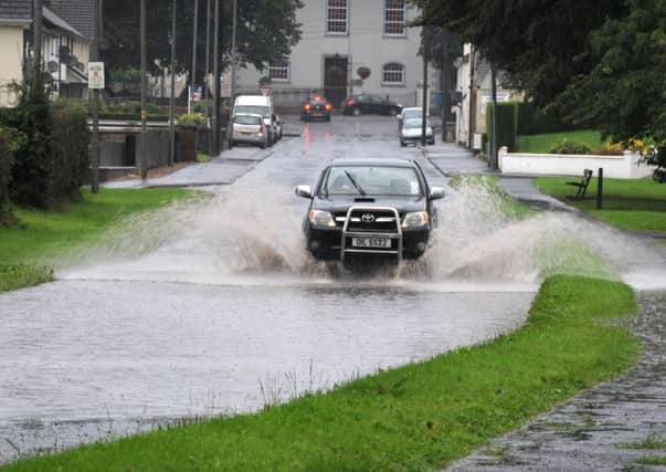 The Moneyhaw Road became heavily flooded after torrential rain. INMM3214-428