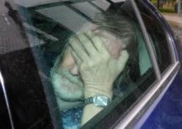 Keith Baker leaves court in Craigavon,