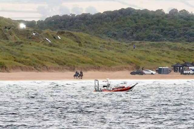 A security boat secures the sea during filming for Games of Thrones in Portstewart Beach PICTURES MARK JAMIESON.
