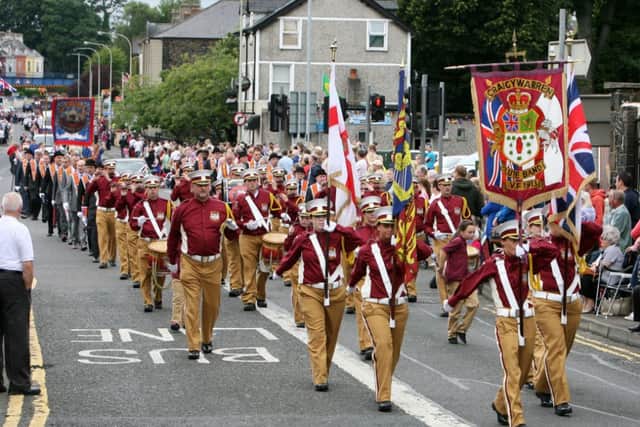 Members of Craigwarren Flute Band marching at the Ballymena Twelfth. INBT29-237AC