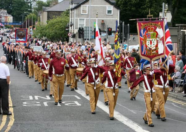 Members of Craigwarren Flute Band marching at the Ballymena Twelfth. INBT29-237AC