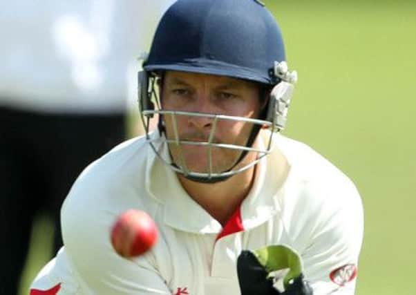 Waringstown wicket keeper Jonathan Bushe and his team will be aiming to get their hansd on the cup this Sunday.