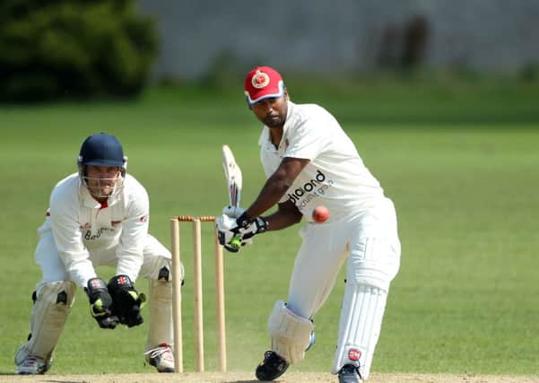 Ballymena Yogesh Takewale lines up a big hit during Saturday's NCU Premier League match against Waringstown at Eaton Park. 
Picture: Press Eye.