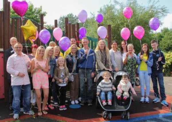 Rebekah's family and friends along with Marcus Cooper, Northern Ireland Hospice Fundraising Manager.