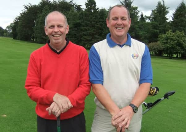 Ian Magowan (left) was third in the BIN 66 competition. Hes pictured alongside playing partner Stanley Dickson.