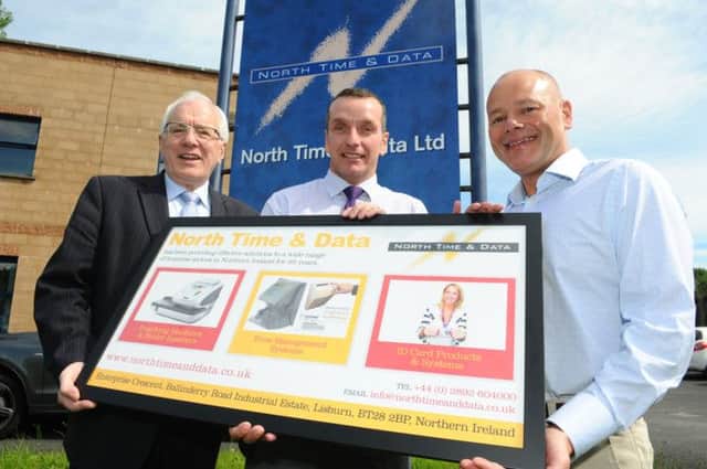 Alderman Allan Ewart, Chairman of the Council's Economic Development Committee is pictured with Stephen Brown, Managing Director of North,Time and Data and Clive Irwin, Business Owner.