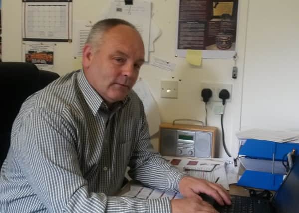 Derek Moore, Bands Forum Co-ordinator, in his office at St Columb's Park House.