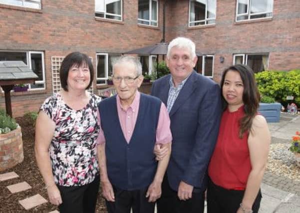 Shirley Lamont, Alex Lamont and Jackie Lamont, who redesigned the garden at Rosevale care home, pictured with Mayvelyn Talug, care home manager. US1433-504cd  Picture: Cliff Donaldson