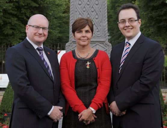 Colin Preen of Hillsborough Strategy Group and Joanne Walker Chair of the Women's Section of the RBL and Councillor Alexander Redpath at the Hillsborough War Memorial during the First World War commemoration on Monday August 4
