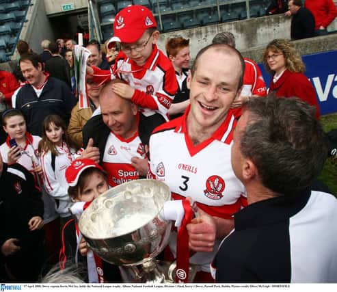 Former Derry captain Kevin McCloy with the 2008 Allianz Division One trophy after defeating Kerry.