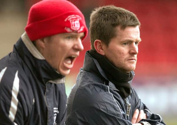 Ballyclare boss Eddie Hill (right), with assistant Gary Bell.