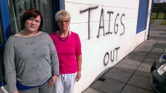 Centre Manager Vicky Moore (left) and CAB District Manager Pat Hutchinson have called for an end to attacks on the Dunanney Centre. Their plea came after sectarian slogans were painted on the front wall of the building overnight on August 13/14 - the fourth attack at the community facility in as many months.