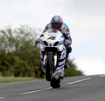 Guy Martin (Tyco Suzuki) wheelies over Deer's Leap on his way to setting fastest time in the Superbike class at today's Ulster Grand Prix practice. PICTURE BY STEPHEN DAVISON