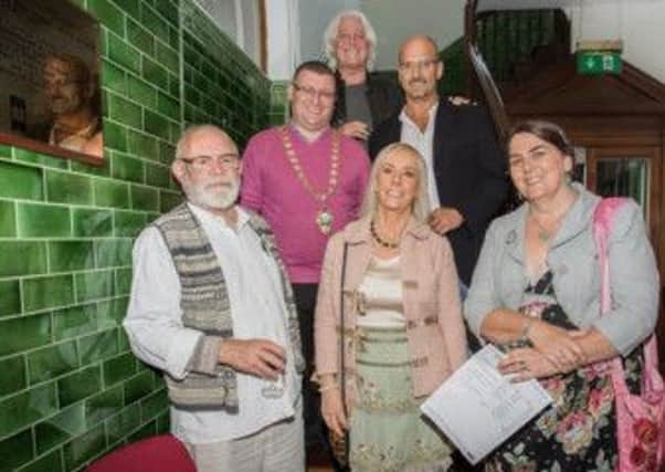 Artists exhibiting at "A Celebration of Larne Art" who attended the launch with Larne mayor Councillor Martin Wilson. INLT 34-654-CON