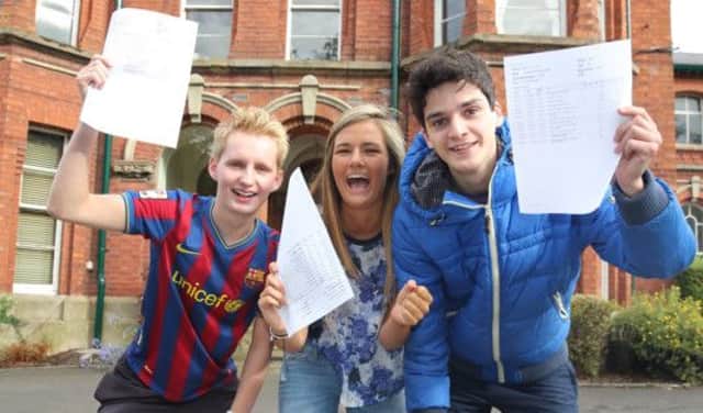 Adam Marshall, Chloe Herdman and Andrew Hanley collect their exam results at Friends. US1433-529cd  Picture: Cliff Donaldson
