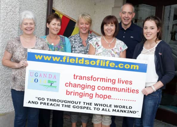 ARE U GAN. Sandra Beattie and her daughter Sara (right) from Garryduff Presbyterian Church, who are heading to Uganda on September 11th to the teacher's building accomodation at Ongoromo School, pictured with Jonathan and Wendy Gault, Teresa Dowey and Lorna Armstrong from Dunloy Presbyterian Church, who are also making the trip.INBM34-14 044SC.