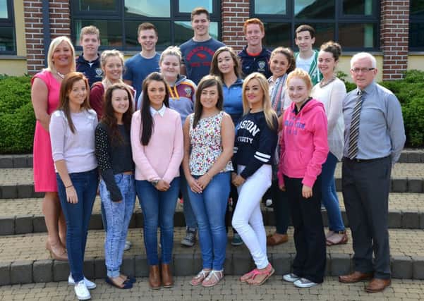 Students from St. Pius X College Magherafelt who achieved A* and A grades in 2 or more subjects at A Level. Also pictured are Mr. Kerr (Head of Year) and Principal Ms. Jackie Bartley.INMM3414-338