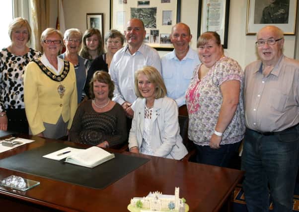 Jackie Francey, Alan Francey and Wilma Krysyna, originally from Ballymena but moved to Australia 48 years ago are pictured with their family at a reception with the Mayor of Ballymena, Cllr. Audrey Wales. This is the first time that they have all visited home together since they first moved from the town. Included are Emma Clarke, Jean McKee, Beverly Richardson, Francis O'Neill, Tom O'Neill, Cheryl Francey and Linda Clarke. INBT34-209AC