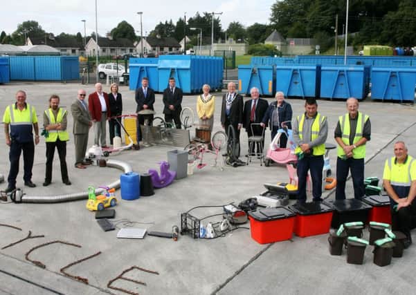 Mayor of Ballymena, Cllr. Audrey Wales, Deputy Mayor, Cllr. Hubert Nicholl, councillors, council staff and recycling centre staff, who have met the 50% recycling target in the borough. INBT34-210AC