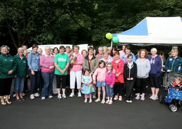 Walkers who took part in a sponsored walk around Portglenone Forest raising money for Macmillan Cancer Support. Included are organisers Margaret McFetridge, Janette McLeister and Phylis McFetridge. INBT34-214AC