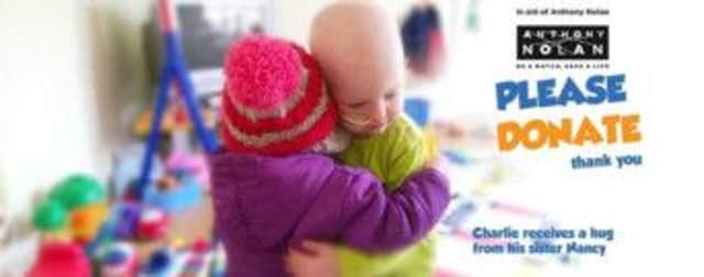 Cycling for Charlie, Charlie receives a big hug from his sister Nancy