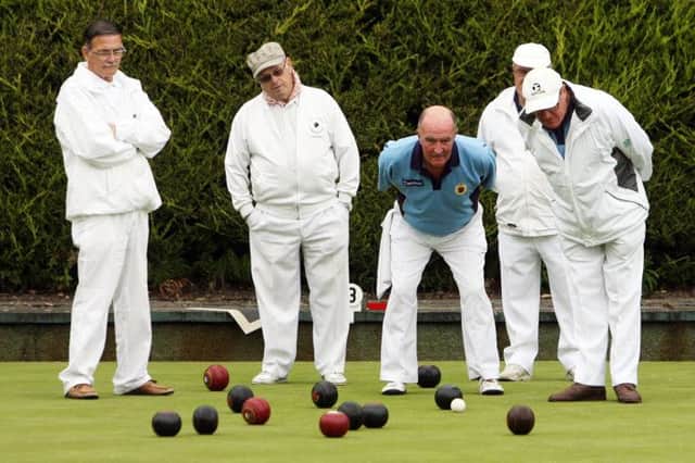 Ballymena Parks and Gallahers bowlers keep a close eye on the state of play during their match last week. INBT34-264AC