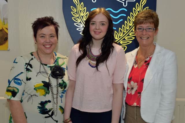 Ballyclare Secondary School head girl, Eden Sloan is pictured with her mum, Alison and school principal, Kathryn Bell after receiving her A Level exam results. INNT 35-006-PSB