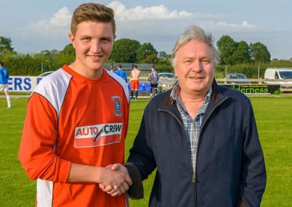 Danny Bann, owner of Autocrew, sponsor of the new Dollingstown away kit with Colin Cunningham.