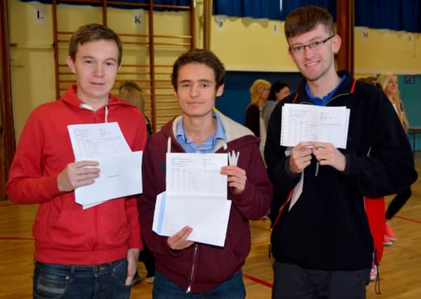 Ryan McDonagh, Bradley Kerr and Adam Tweedie receiving their grades.  INCT 34-105-GR