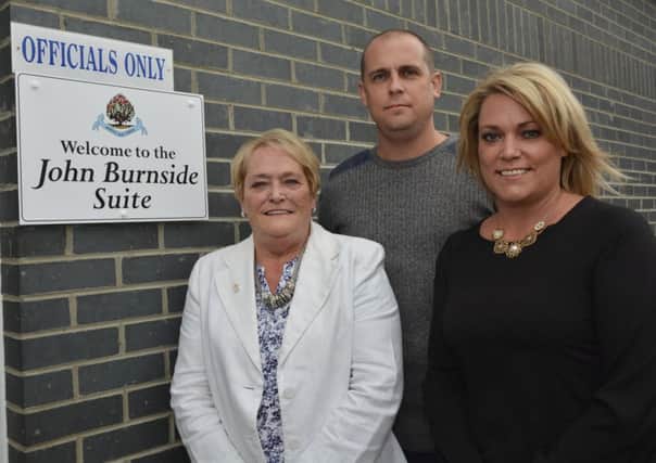 The family of the late Johnny Burnside, from left, Yvonne, Ashley and Alison, pictured at the opening of the John Burnside Suite by Institute Football Club at the Riverside Stadium. INLS3314-132KM