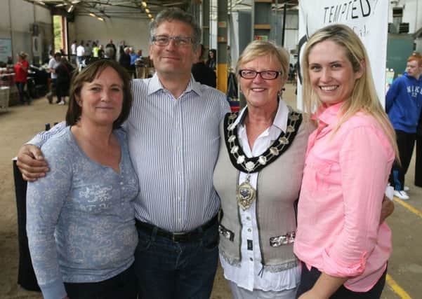 Mayor of Ballymena, Cllr. Audrey Wales, pictured with Veronica, Roy and Dawn McKeown at the Mill Fest opening. INBT34-232AC