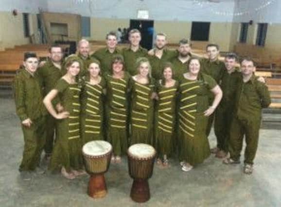 The team from Belfast City Mission pictured wearing traditional dress during their trip to Burkina Faso, Africa.