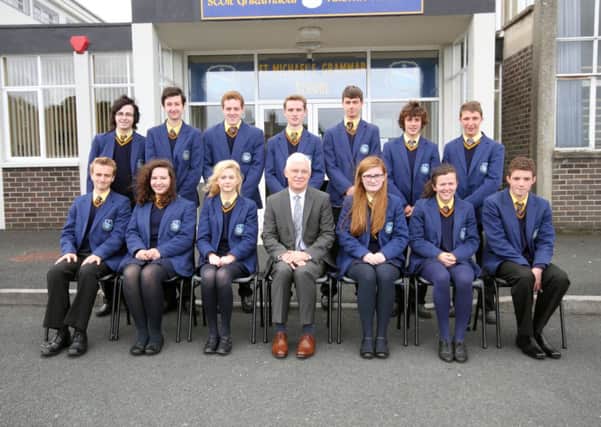 Top As level achievers from St. Michael's Grammer School 2014 pictured with Principal Gerard Adams. Not available for the photograph were Adam Kelly & Eimear Henderson. INLM33-760