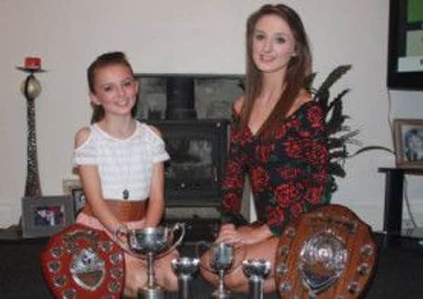 Gemma and Amy with their trophy haul, won just weeks before Amy returned to hospital for further chemotherapy treatment.