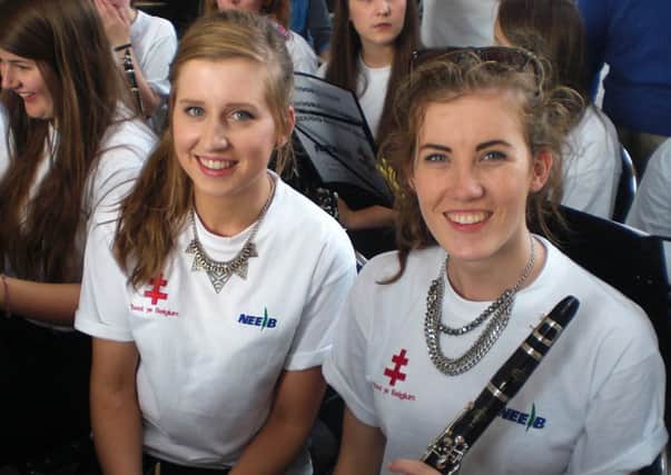 Antrim Youth Orchestra members Michaela Mulvenna and Caoimhe Mc Donnell, who played at the Menin Gate war memorial in Ypres. INLT-34-720-con