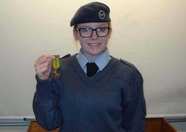 Cadet Megan Reid from 806 (Larne) Squadron Air Cadets, who recently completed the arduous 100 mile Nijmegen March in Holland. INLT-34-722-con