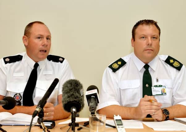 Representatives of Essex Police the East of England Ambulance service, during a press conference close to Tilbury Docks in Essex, where a container was found with over 30 illegal immigrants were found inside with one dead and the rest ill and taken to hospital.