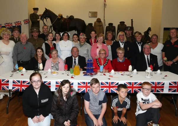 Organisers and special guests at last week's Ballymena South Cluster World War One centenary event in Ballykeel Community Centre. INBT 35-107JC